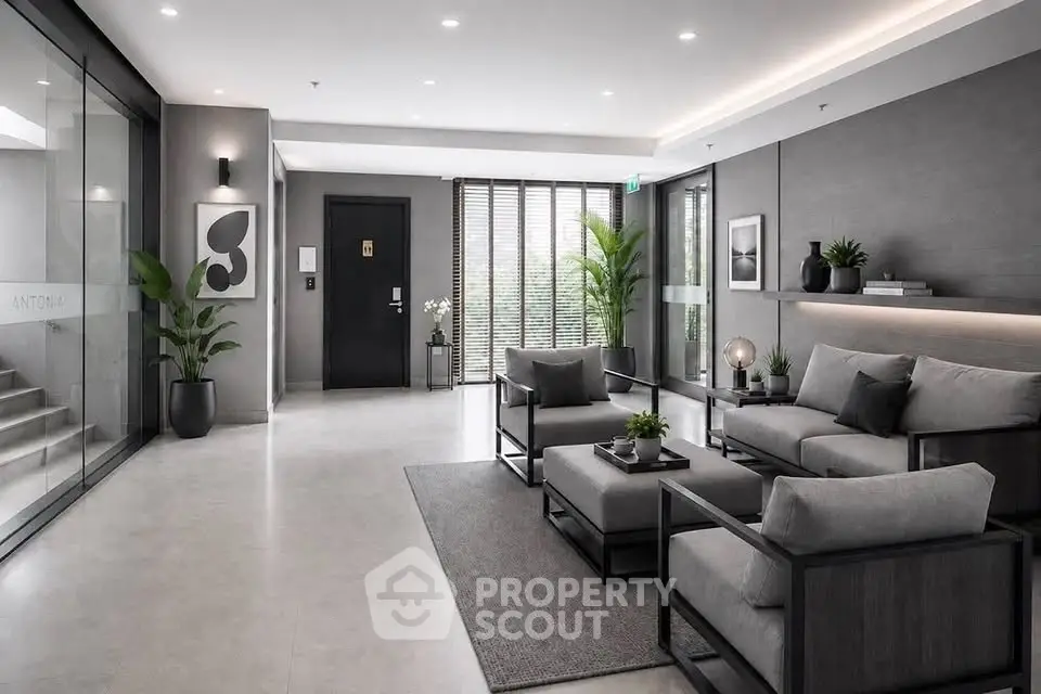 Modern and elegant lobby with stylish seating and decor, perfect for welcoming guests.