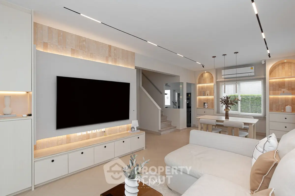 Luxurious modern living room with elegant lighting and spacious design