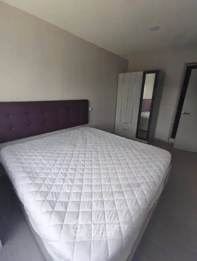 Spacious bedroom with modern design and large bed