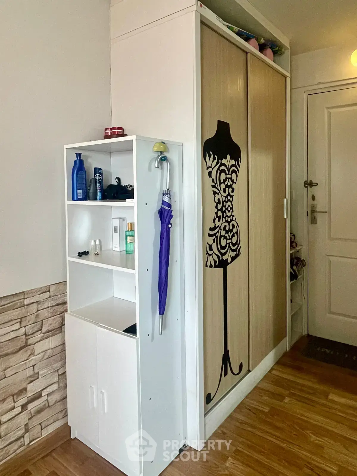 Stylish interior with modern storage solutions and elegant decor in a cozy living space.