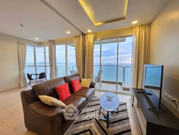 Stunning ocean view living room with modern decor and large windows