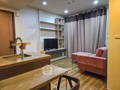 Modern living room with stylish furniture and open kitchen layout