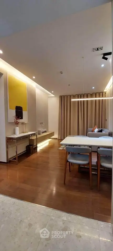 Modern living room with elegant dining area and stylish decor