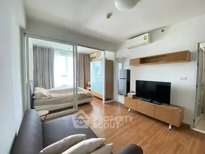 Modern studio apartment with open layout and stylish furnishings