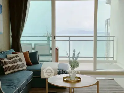 Luxurious living room with stunning ocean view and elegant decor