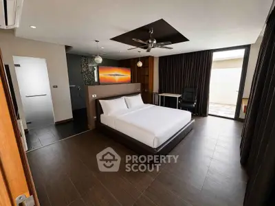Luxurious modern bedroom with elegant decor and ample natural light