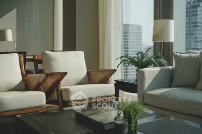 Luxurious modern living room with elegant furniture and city view, perfect for urban living.