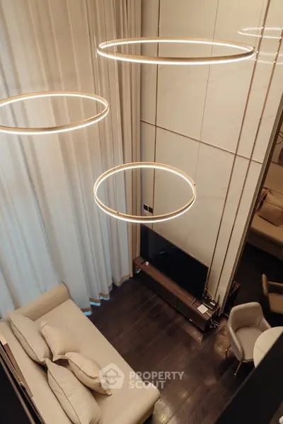 Luxurious modern living room with elegant lighting and stylish decor