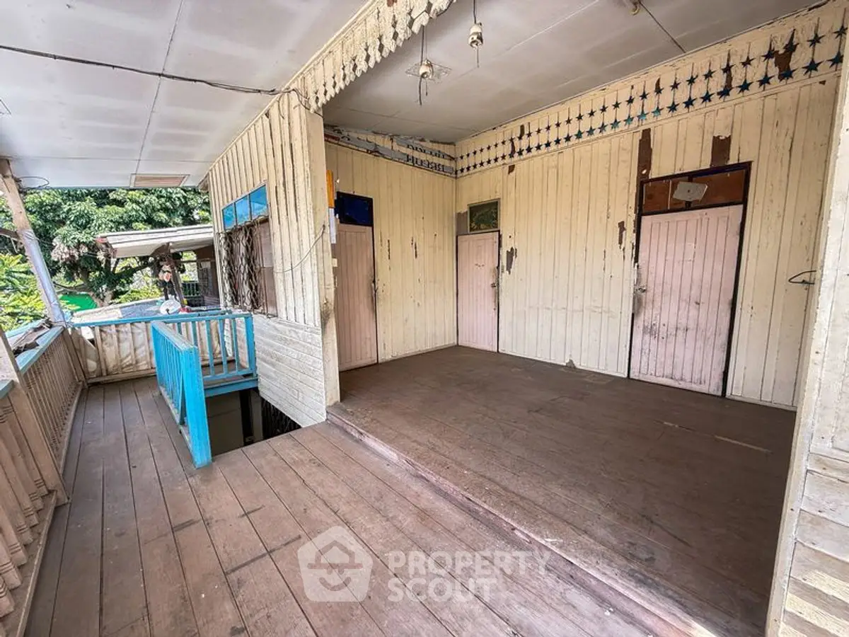 Charming rustic balcony with vintage wooden decor and open space, perfect for relaxation and outdoor enjoyment.