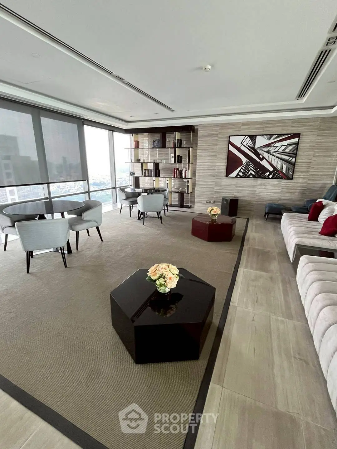 Luxurious living room with modern decor and panoramic city views