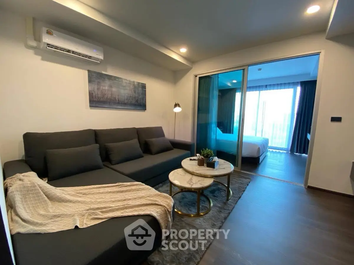 Modern living room with cozy sofa and elegant decor in a stylish apartment