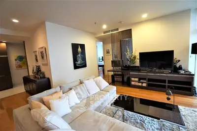 Spacious modern living room with cozy seating and stylish decor