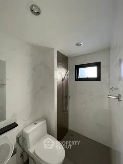Modern bathroom with shower and natural light