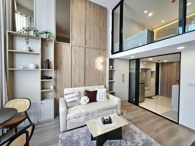 Modern duplex living room with high ceilings and stylish decor