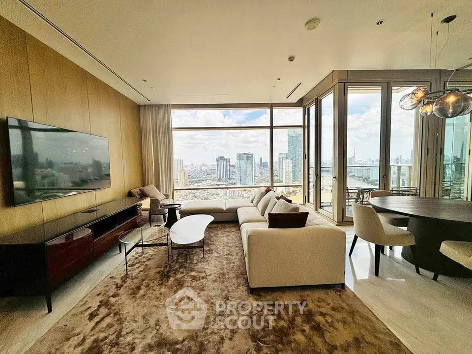 Luxurious living room with panoramic city view and modern furnishings