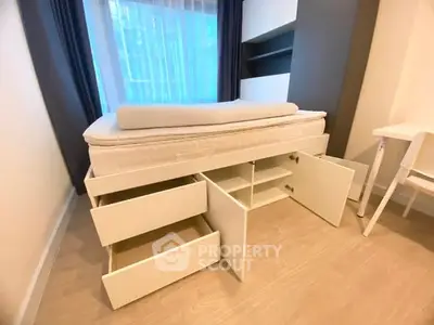 Modern bedroom with storage bed and sleek design