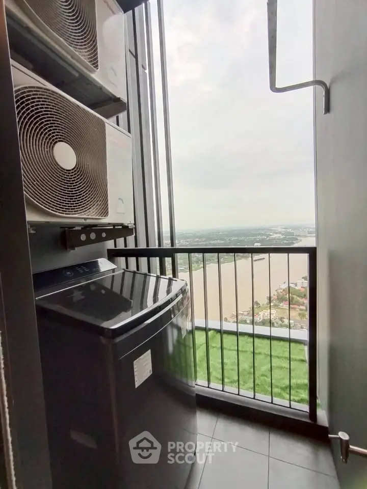 High-rise balcony with stunning river view and modern appliances