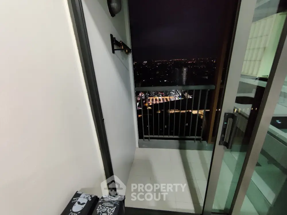 Stunning night city view from modern apartment balcony