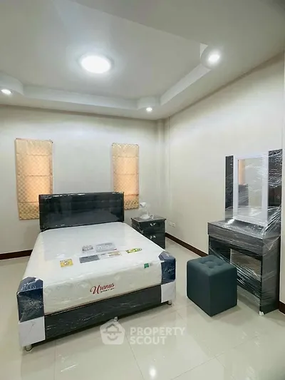 Modern bedroom with stylish furniture and elegant lighting