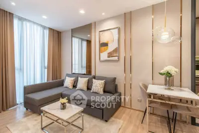 Modern living room with stylish decor and cozy seating area in a contemporary apartment.