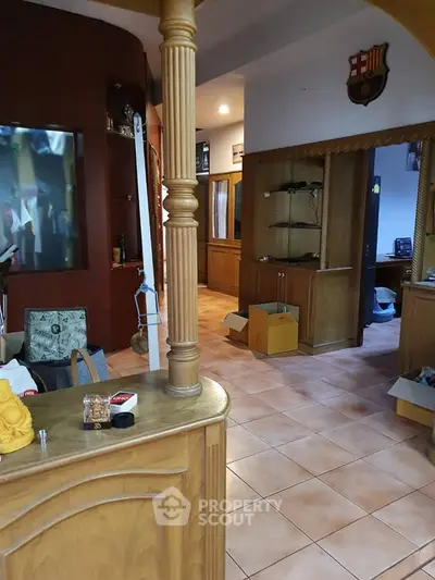 Spacious interior with wooden accents and open layout, ideal for cozy living.