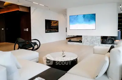 Luxurious modern living room with sleek design and large TV