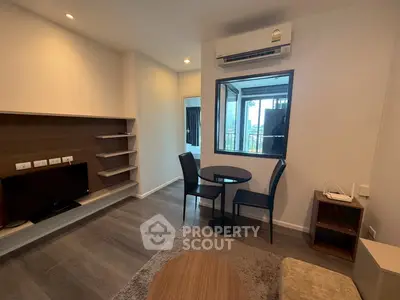 Modern living room with air conditioning and balcony view