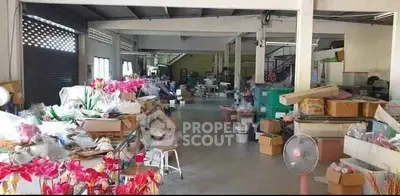 Spacious warehouse interior with ample storage and natural light, ideal for business operations.