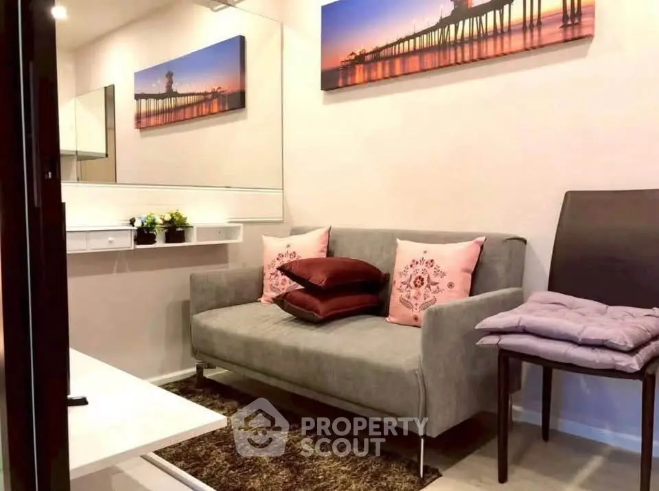 Charming living room with modern decor and cozy seating, perfect for relaxation and entertaining guests.