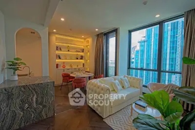 Luxurious living room with modern decor and stunning city view, featuring elegant furniture and ambient lighting.