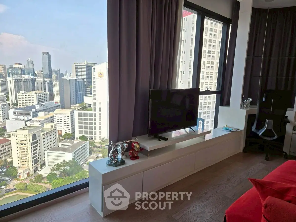 Modern living room with stunning city view and sleek decor
