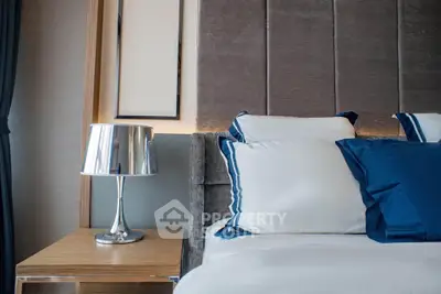 Luxurious bedroom with elegant decor and plush bedding