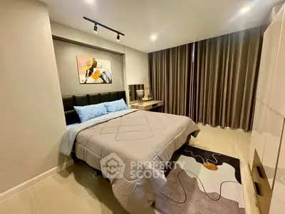 Modern bedroom with stylish decor and cozy ambiance, featuring a comfortable bed and elegant lighting.