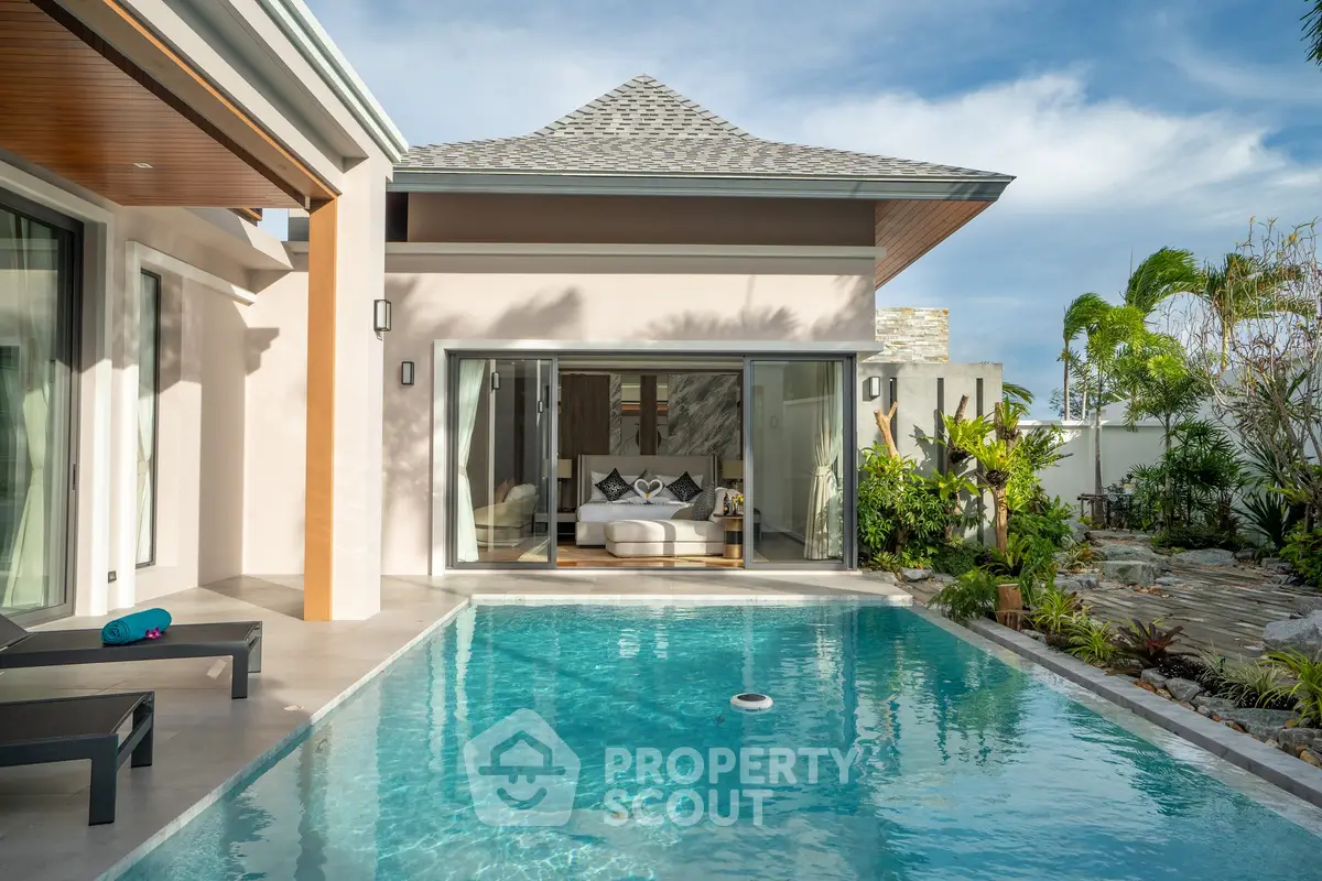 Luxurious villa with private pool and modern design, perfect for relaxation and tropical living.