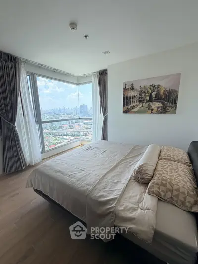 Luxurious bedroom with panoramic city view and elegant decor