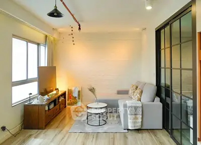 Chic modern living room with cozy sofa and stylish decor