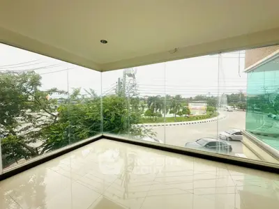Spacious corner unit with panoramic glass windows offering a stunning view of the cityscape.