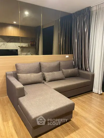 Modern living room with stylish sofa and elegant curtains