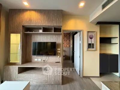 Modern living room with stylish wooden TV unit and contemporary decor