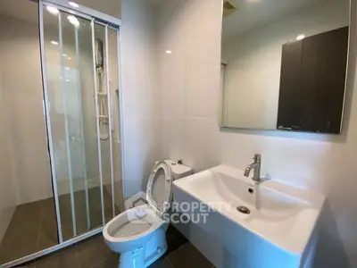 Modern bathroom with sleek shower and contemporary fixtures