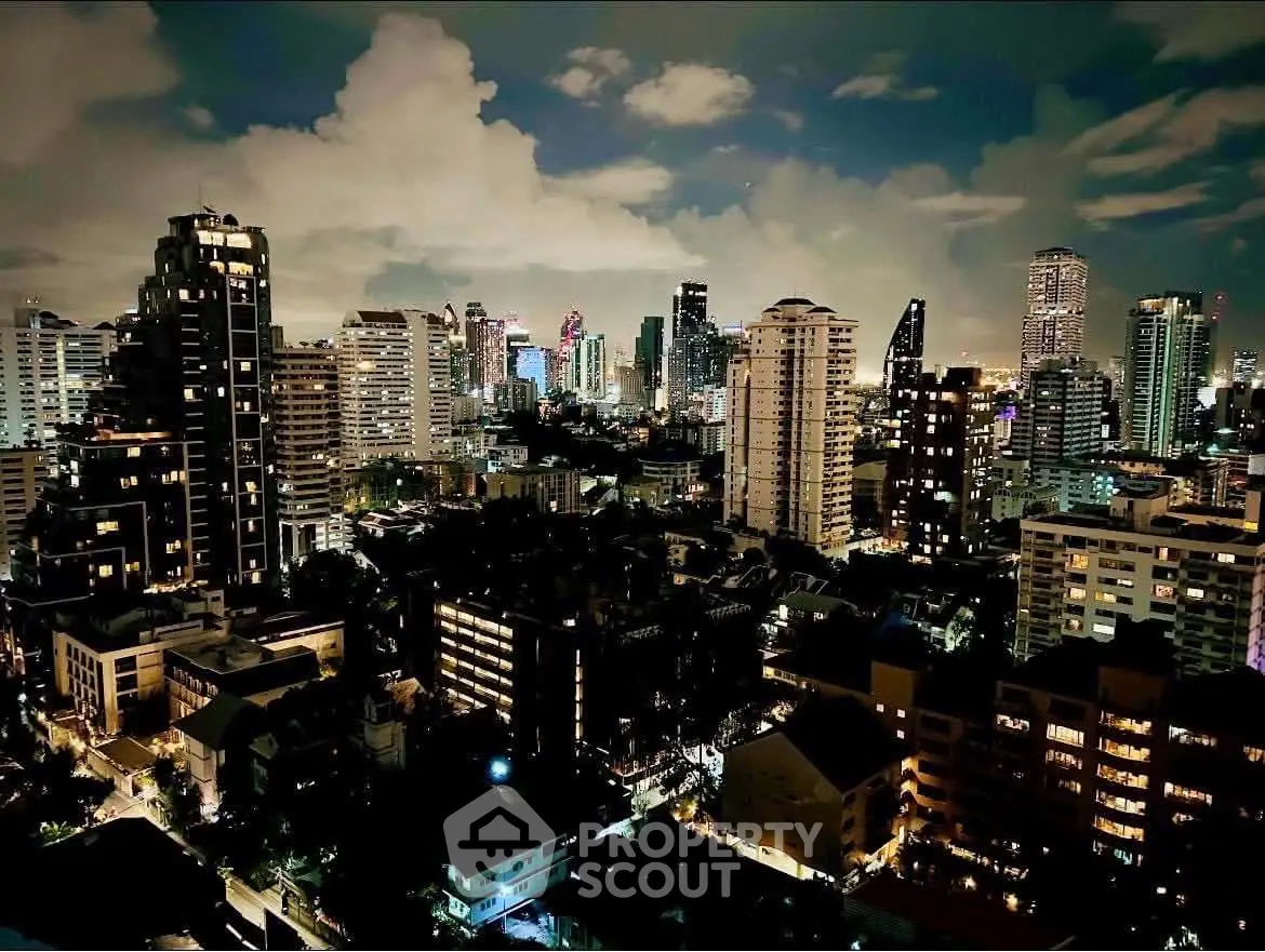 Stunning nighttime cityscape with illuminated skyscrapers and vibrant skyline.