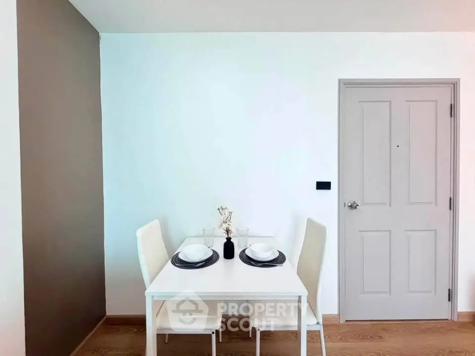 Cozy dining area with modern table and chairs in a stylish apartment