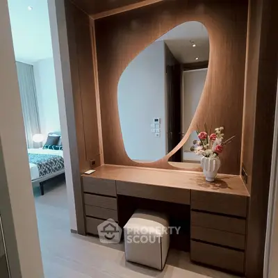 Elegant bedroom with modern wooden vanity and stylish decor