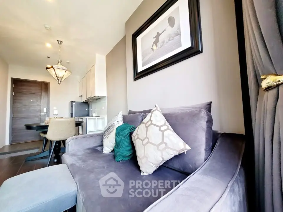Stylish modern living room with plush sofa and elegant decor in a contemporary apartment.