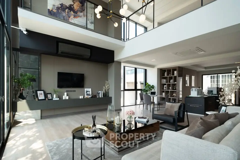 Luxurious modern living room with high ceilings and elegant decor