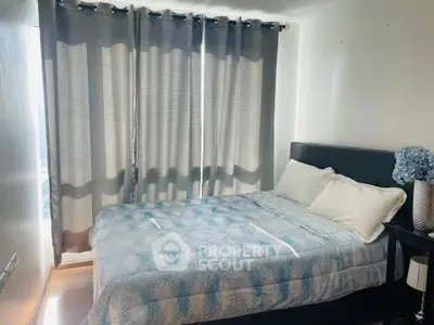 Cozy bedroom with modern decor and natural light