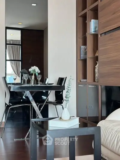 Modern living room with elegant dining area and stylish decor