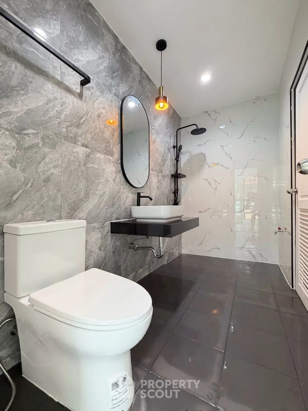 Modern bathroom with sleek fixtures and elegant marble walls