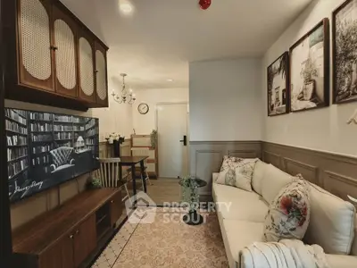Charming living room with elegant decor and cozy seating area, perfect for relaxation and entertainment.