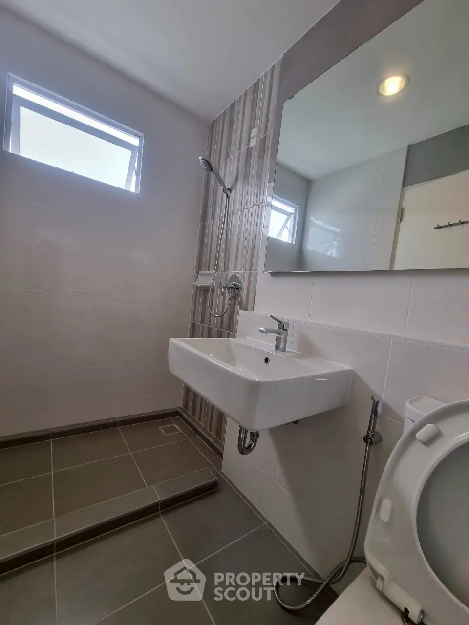 Modern bathroom with sleek fixtures and natural light